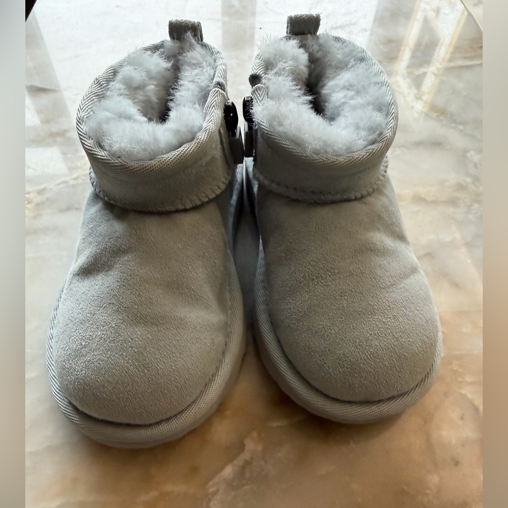 Toddler Ugg boots, light blue, never worn, perfect for winter and spring